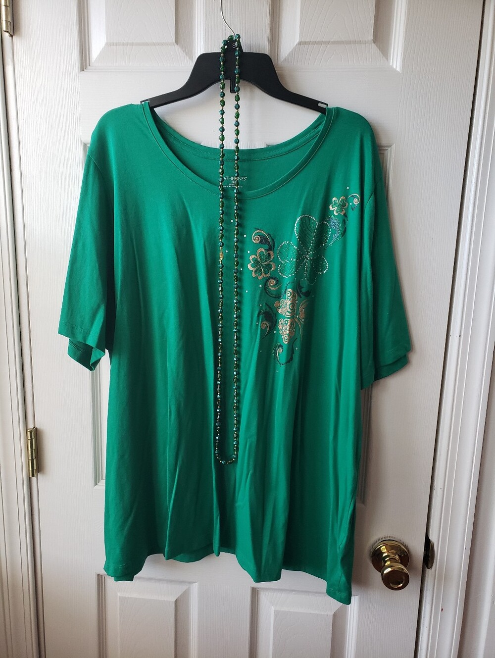 Catherines Emerald Green Short Sleeve Scoop Neck Top with Floral Embellishment.